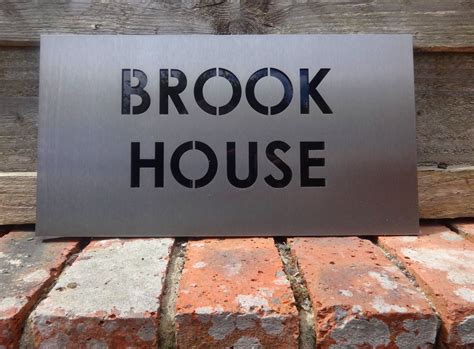 personalised metal house signs|free standing metal house signs.